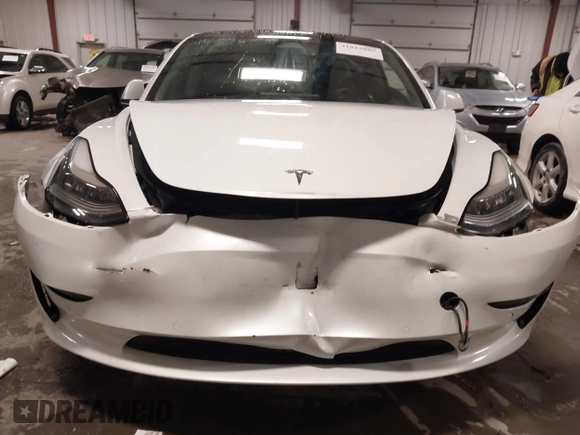 2018 Tesla Model 3 Long Range Battery with VIN 5YJ3E1EA8JF154738, listed as a IAAI auction lot 41013807 with 115,488 mi miles and . Bid and sale history available at DreamBid. Image 6.