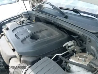 2018 Jeep Grand Cherokee Sterling with VIN 1C4RJEBG0JC304599, listed as a IAAI auction lot 42394600 with 124,955 mi miles and . Bid and sale history available at DreamBid. Image 20.