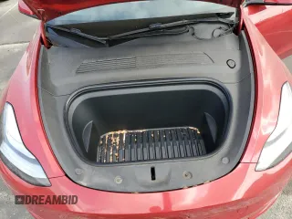 2021 Tesla Model Y Long Range with VIN 5YJYGDEEXMF217816, listed as a Copart auction lot 51008665 with 57,392 mi miles and Salvage Title. Bid and sale history available at DreamBid. Image 12.