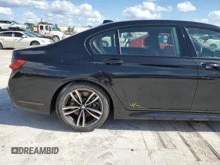 2020 BMW 7 Series 750i xDrive with VIN WBA7U2C0XLGM27270, listed as a Copart auction lot 77241404 with 68,998 mi miles and Salvage Title. Bid and sale history available at carsss.com. Image 12.