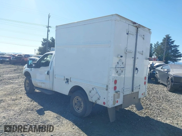 2012 Ford Super Duty F-250 SRW XL with VIN 1FDBF2B62CEB18607, listed as a IAAI auction lot 41995836 with 597,268 mi miles. Bid and sale history available at carsss.com. Image 3.