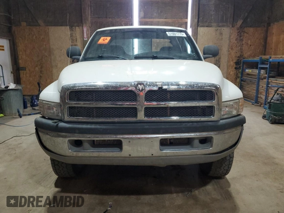 2002 Dodge 2500 z VIN 3B7KF236X2M256911, wystawiony jako Copart lot #51001775 z przebiegiem 208 199 mil mil oraz Tytuł czysty. Historia ofert i sprzedaży dostępna na DreamBid. Obrazek 5.