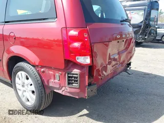 2014 Dodge Grand Caravan American Value with VIN 2C4RDGBG4ER366328, listed as a IAAI auction lot 42127426 with 69,358 mi miles and . Bid and sale history available at DreamBid. Image 13.