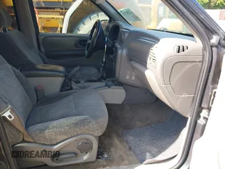 2003 Chevrolet TrailBlazer LTZ with VIN 1GNDT13S832107938, listed as a IAAI auction lot 42208232 with 234,130 mi miles and . Bid and sale history available at DreamBid. Image 5.
