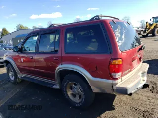 1999 Ford Explorer XLT with VIN 1FMDU34E7XZA60386, listed as a Copart auction lot 86851594 with 218,592 mi miles and Salvage title. Bid and sale history available at DreamBid. Image 2.