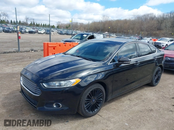 2014 Ford Fusion SE with VIN 3FA6P0HD1ER373400, listed as a IAAI auction lot 42046660 with 191,621 mi miles and . Bid and sale history available at DreamBid. Image 2.
