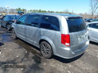 2017 Dodge Grand Caravan SE with VIN 2C4RDGBG9HR732854, listed as a IAAI auction lot 41980430 with 124,726 mi miles and . Bid and sale history available at DreamBid. Image 3.