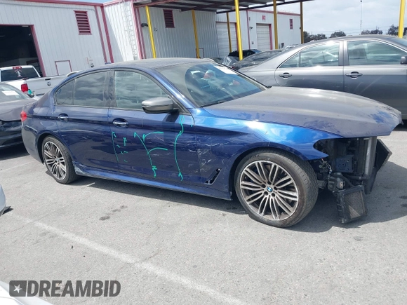 2018 BMW 5 Series M550i xDrive with VIN WBAJB9C59JB049436, listed as a IAAI auction lot 42126762 with 126,684 mi miles and . Bid and sale history available at DreamBid. Image 14.