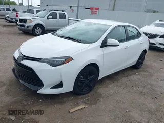 2019 Toyota Corolla L with VIN 5YFBURHE1KP930676, listed as a IAAI auction lot 41940047 with 82,885 mi miles. Bid and sale history available at carsss.com. Image 2.