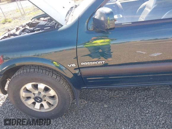 1998 Honda Passport LX z VIN 4S6CM58W0W4407344, wystawiony jako IAAI lot #42201105 z przebiegiem 254 317 mil mil oraz . Historia ofert i sprzedaży dostępna na DreamBid. Obrazek 6.