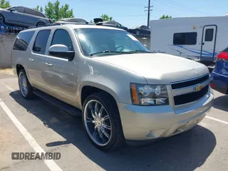 2014 Chevrolet Suburban LT with VIN 1GNSCJE05ER117100, listed as a IAAI auction lot 42624986 with 198,729 mi miles and . Bid and sale history available at DreamBid. Image 1.