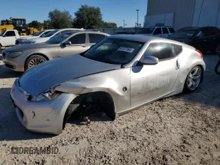 2010 Nissan 370Z Touring with VIN JN1AZ4EH1AM504859, listed as a Copart auction lot 87377564 with 98,765 mi miles and Salvage Title. Bid and sale history available at carsss.com. Image 1.