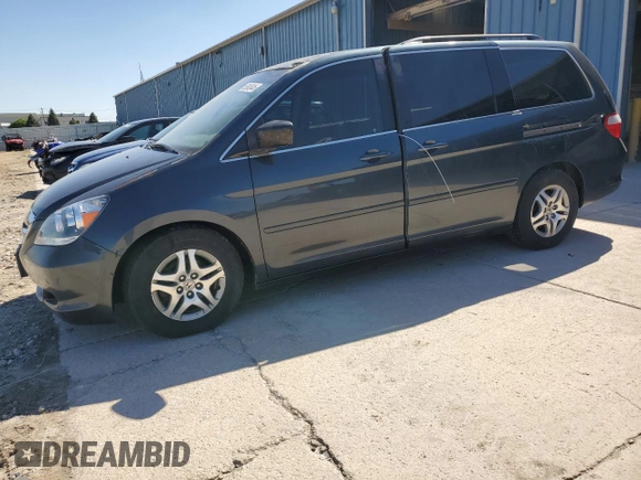 2005 Honda Odyssey EX z VIN 5FNRL38455B400474, wystawiony jako Copart lot #55845445 z przebiegiem Nie podano mil oraz Czysty tytuł • Clean title. Historia ofert i sprzedaży dostępna na DreamBid. Obrazek 1.