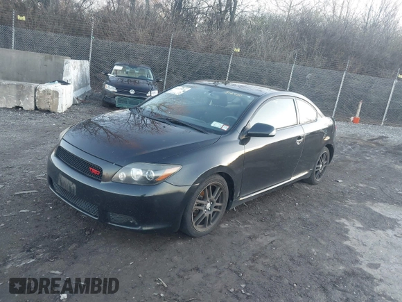 2010 Scion tC with VIN JTKDE3B74A0312430, listed as a IAAI auction lot 41125030 with 194,052 mi miles. Bid and sale history available at carsss.com. Image 2.