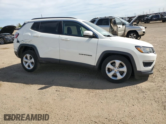 2019 Jeep Compass Latitude z VIN 3C4NJDBB4KT704264, wystawiony jako Copart lot #56062825 z przebiegiem 59 078 mil mil oraz Szkoda całkowita • Salvage title. Historia ofert i sprzedaży dostępna na DreamBid. Obrazek 4.