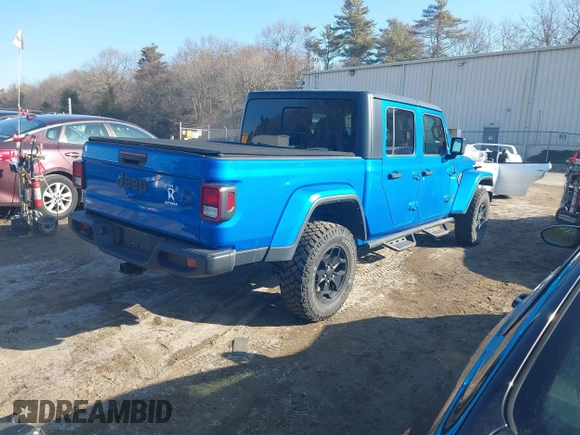 2021 Jeep Gladiator Willys with VIN 1C6HJTAG3ML572690, listed as a IAAI auction lot 41649907 with 74,734 mi miles and . Bid and sale history available at DreamBid. Image 4.