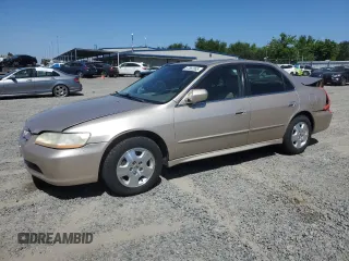 2002 Honda Accord EX z VIN 1HGCG16512A051099, wystawiony jako Copart lot #57882085 z przebiegiem 194 939 mil mil oraz Szkoda całkowita • Salvage title. Historia ofert i sprzedaży dostępna na DreamBid. Obrazek 1.