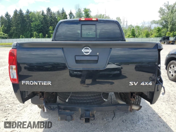 2018 Nissan Frontier SV with VIN 1N6AD0EV5JN745860, listed as a Copart auction lot 61404925 with 63,110 mi miles and Salvage title. Bid and sale history available at DreamBid. Image 6.