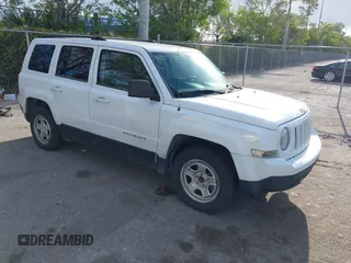 2014 Jeep Patriot Sport with VIN 1C4NJPBBXED671220, listed as a IAAI auction lot 42163245 with 216,848 mi miles. Bid and sale history available at carsss.com. Image 1.