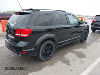 2013 Dodge Journey SXT with VIN 3C4PDDBG4DT660474, listed as a IAAI auction lot 41984607 with 124,926 mi miles and . Bid and sale history available at DreamBid. Image 4.