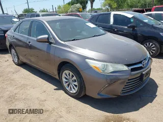 2016 Toyota Camry XLE with VIN 4T4BF1FK4GR581867, listed as a IAAI auction lot 42002126 with 74,811 mi miles. Bid and sale history available at carsss.com. Image 1.