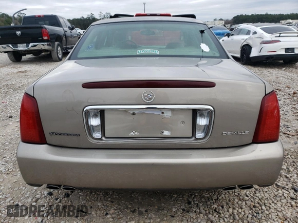 2003 Cadillac DeVille with VIN 1G6KD54Y03U206526, listed as a Copart auction lot 38023213 with 103,724 mi miles and Salvage Title. Bid and sale history available at carsss.com. Image 6.