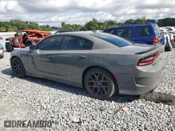 2019 Dodge Charger Scat Pack z VIN 2C3CDXGJ2KH633854, wystawiony jako Copart lot #53296705 z przebiegiem 74 285 mil mil oraz Czysty tytuł • Clean title. Historia ofert i sprzedaży dostępna na DreamBid. Obrazek 2.