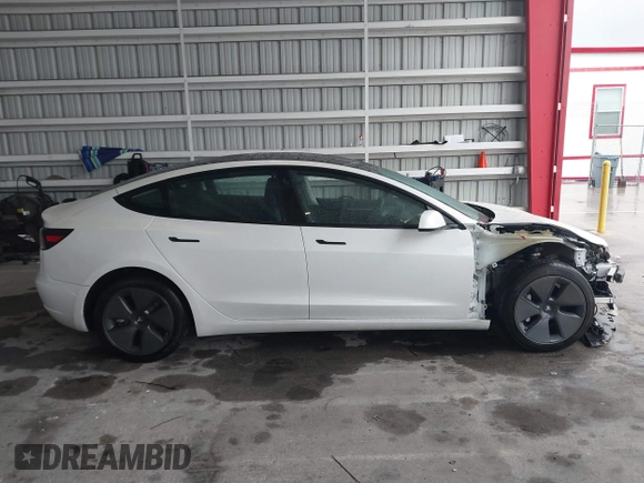 2023 Tesla Model 3 with VIN 5YJ3E1EA9PF548726, listed as a IAAI auction lot 42345157 with 30,647 mi miles and . Bid and sale history available at DreamBid. Image 14.