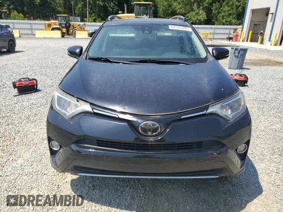 2018 Toyota RAV4 XLE with VIN 2T3WFREV6JW495822, listed as a Copart auction lot 62555325 with 88,808 mi miles and Salvage title. Bid and sale history available at DreamBid. Image 5.