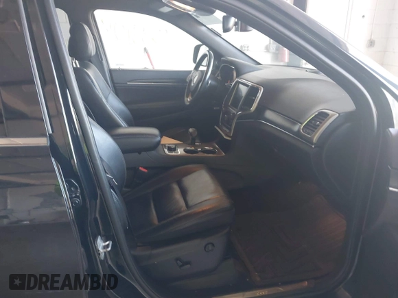 2014 Jeep Grand Cherokee Limited with VIN 1C4RJFBT2EC147036, listed as a IAAI auction lot 42533104 with 154,543 mi miles and . Bid and sale history available at DreamBid. Image 5.
