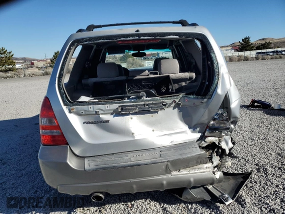 2003 Subaru Forester XS with VIN JF1SG65603G741030, listed as a Copart auction lot 46109315 with 154,469 mi miles and Salvage title. Bid and sale history available at DreamBid. Image 6.