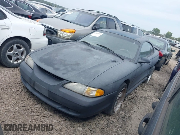 1997 Ford Mustang with VIN 1FALP4043VF158166, listed as a IAAI auction lot 39369761 with 124,992 mi miles. Bid and sale history available at carsss.com. Image 2.