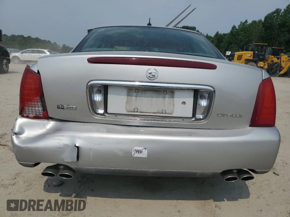 2005 Cadillac DeVille z VIN 1G6KD54Y85U187078, wystawiony jako Copart lot #58547715 z przebiegiem 95 905 mil mil oraz Szkoda całkowita • Salvage title. Historia ofert i sprzedaży dostępna na DreamBid. Obrazek 6.