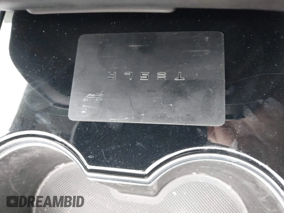 2018 Tesla Model 3 Long Range Battery with VIN 5YJ3E1EB3JF119498, listed as a IAAI auction lot 41966643 with 45,566 mi miles and . Bid and sale history available at DreamBid. Image 11.
