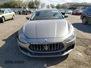 2019 Maserati Ghibli z VIN ZAM57XSA4K1315392, wystawiony jako Copart lot #67172684 z przebiegiem 30 544 mil mil oraz Szkody całkowita. Historia ofert i sprzedaży dostępna na DreamBid. Obrazek 5.