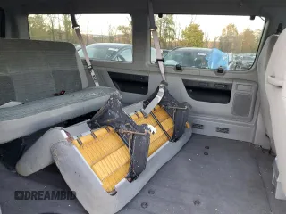 2000 Ford Econoline Passenger XL with VIN 1FMRE11W0YHB98637, listed as a Copart auction lot 76061284 with 87,971 mi miles and Non Repairable. Bid and sale history available at DreamBid. Image 11.