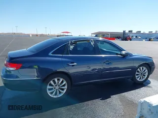 2007 Hyundai Azera SE z VIN KMHFC46F77A153141, wystawiony jako IAAI lot #41731777 z przebiegiem Nie podano mil oraz . Historia ofert i sprzedaży dostępna na DreamBid. Obrazek 13.