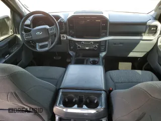 2021 Ford F-150 XL with VIN 1FTFW1E5XMFA47980, listed as a Copart auction lot 56737215 with 63,781 mi miles and Salvage title. Bid and sale history available at DreamBid. Image 8.
