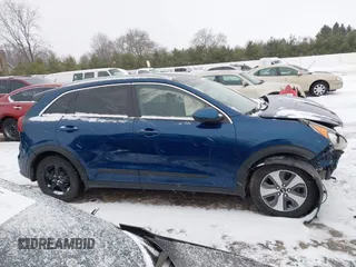 2019 Kia Niro LX with VIN KNDCB3LC5K5216561, listed as a IAAI auction lot 41004309 with 121,617 mi miles and . Bid and sale history available at DreamBid. Image 14.