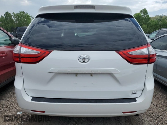 2015 Toyota Sienna LE with VIN 5TDJK3DC2FS126466, listed as a Copart auction lot 61165105 with 56,634 mi miles and Salvage title. Bid and sale history available at DreamBid. Image 6.