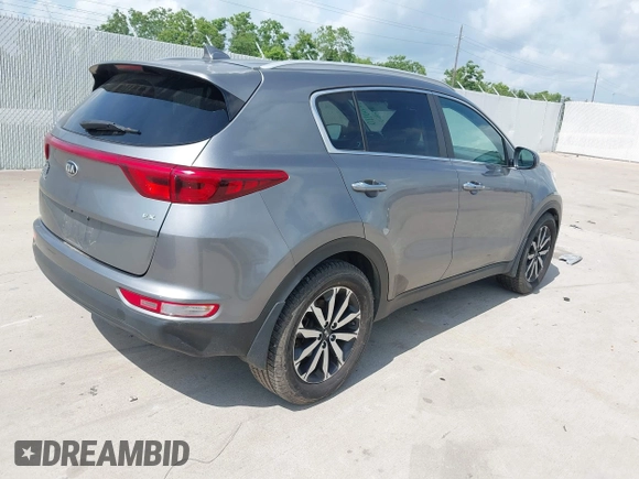 2017 Kia Sportage EX with VIN KNDPN3AC7H7083648, listed as a IAAI auction lot 42464382 with 200,167 mi miles and . Bid and sale history available at DreamBid. Image 4.