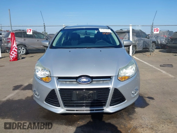 2012 Ford Focus SE z VIN 1FAHP3F28CL215997, wystawiony jako IAAI lot #42483639 z przebiegiem 101 518 mil mil oraz . Historia ofert i sprzedaży dostępna na DreamBid. Obrazek 12.