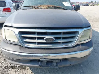 2003 Ford F-150 XL with VIN 2FTRX07W93CB11978, listed as a IAAI auction lot 42549547 with 209,486 mi miles and . Bid and sale history available at DreamBid. Image 6.