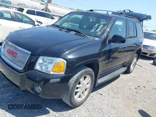 2006 GMC Envoy Denali with VIN 1GKES63M262344853, listed as a IAAI auction lot 42024960 with 183,066 mi miles. Bid and sale history available at carsss.com. Image 2.