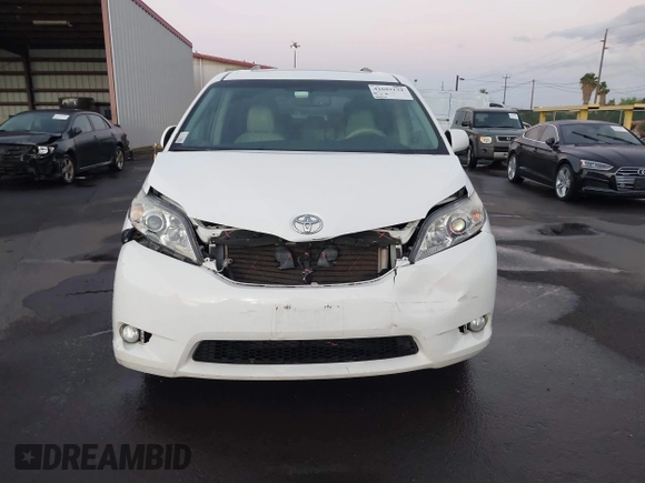 2014 Toyota Sienna XLE with VIN 5TDYK3DC1ES429932, listed as a IAAI auction lot 41692134 with 93,625 mi miles. Bid and sale history available at carsss.com. Image 13.