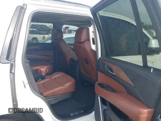 2020 Cadillac Escalade Luxury z VIN 1GYS3BKJ3LR144735, wystawiony jako IAAI lot #42161511 z przebiegiem 77 990 mil mil oraz . Historia ofert i sprzedaży dostępna na DreamBid. Obrazek 8.