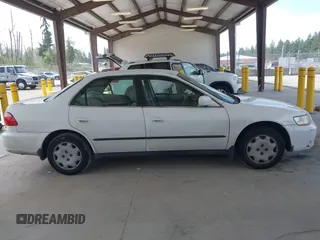 1998 Honda Accord LX with VIN 1HGCG5640WA004358, listed as a IAAI auction lot 42643808 with Not provided miles and . Bid and sale history available at DreamBid. Image 13.