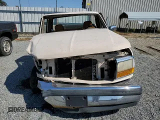 1992 Ford F-150 z VIN 1FTDF15NXNNA61991, wystawiony jako Copart lot #73393234 z przebiegiem Nie podano mil oraz Szkoda całkowita • Salvage title. Historia ofert i sprzedaży dostępna na DreamBid. Obrazek 5.