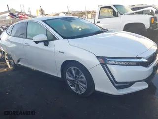 2018 Honda Clarity Plug-In Hybrid with VIN JHMZC5F11JC013866, listed as a IAAI auction lot 38266703 with 97,522 mi miles. Bid and sale history available at carsss.com. Image 1.