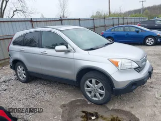 2009 Honda CR-V EX-L with VIN JHLRE487X9C021566, listed as a IAAI auction lot 42008321 with 128,647 mi miles and . Bid and sale history available at carsss.com. Image 13.